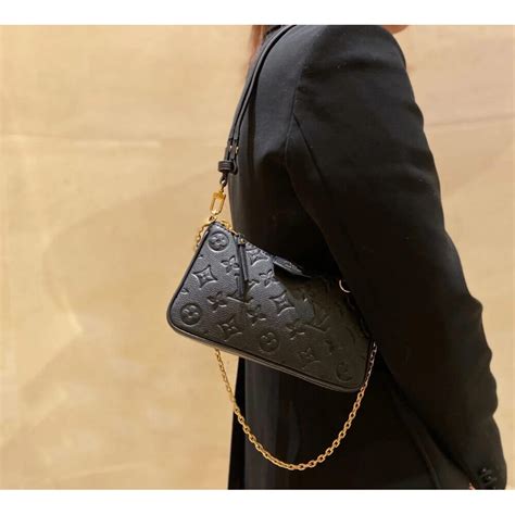 louis vuitton easy pouch on strap black monogram empreinte|easy pouch on strap ivory.